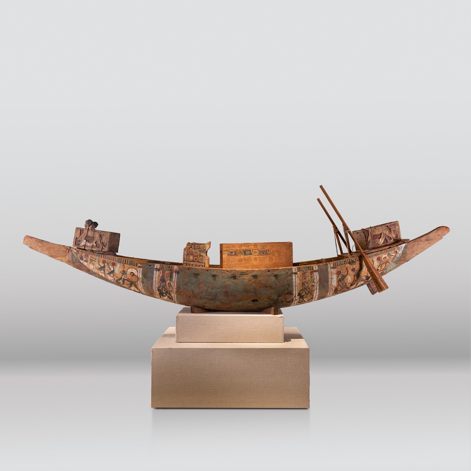 An ancient Egyptian ship model inside The National Museum of Egyptian Civilization