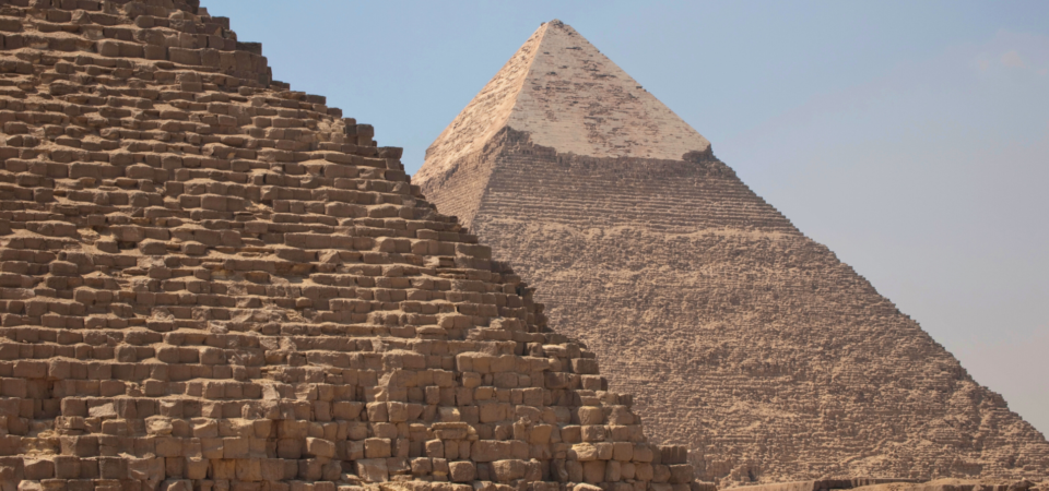 View of the Khufu Pyramid from a neighboring pyramid, showcasing its massive structure