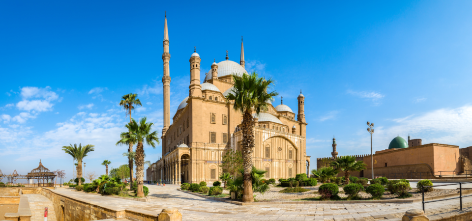 Wide-angle view of Salah El-Din Citadel in Cairo, showcasing its impressive walls and minarets.