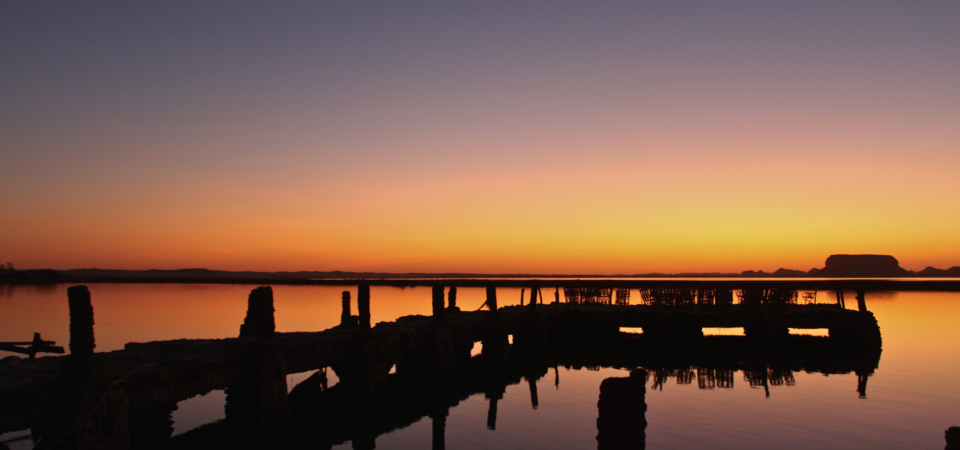 Siwa sunset over bridge at Fatnas island