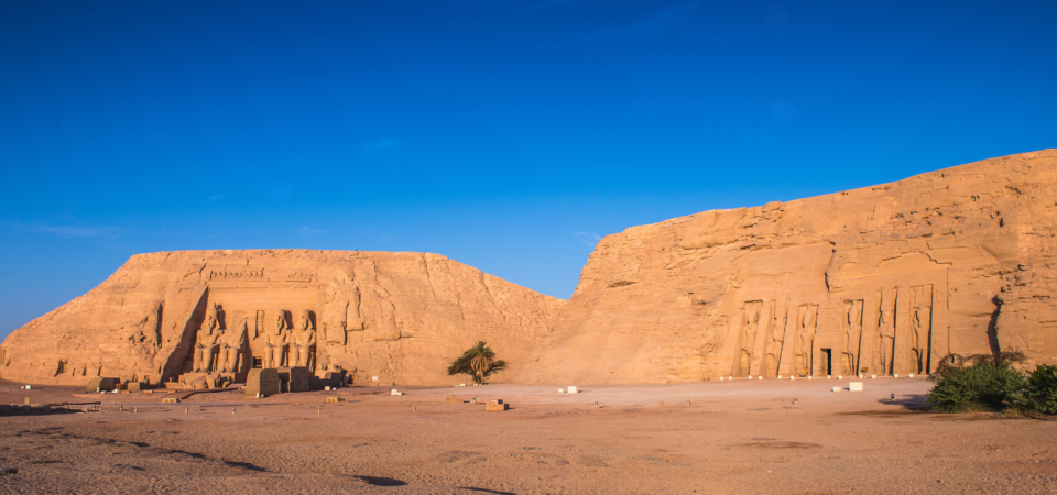 Abu Simbel Temple and the nearby Temple of Hathor, both carved into the rock, with colossal statues.