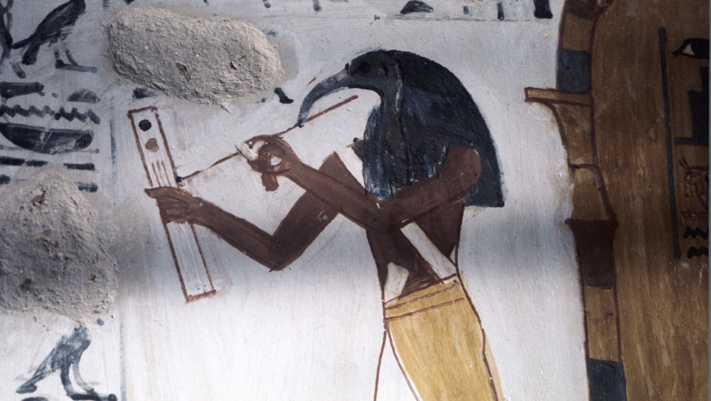 A wall painting depicting Thoth, the ibis-headed god of wisdom and magic, holding a scribe's palette and stylus.