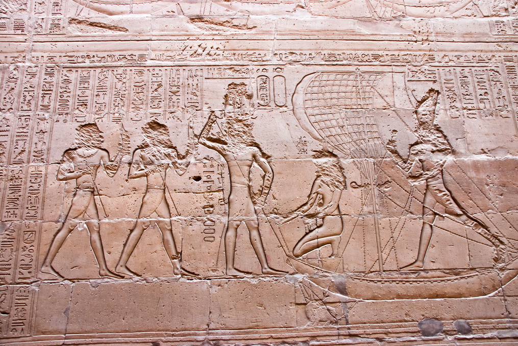 A relief carving from the Temple of Edfu depicting Horus battling Seth in the form of a hippopotamus.