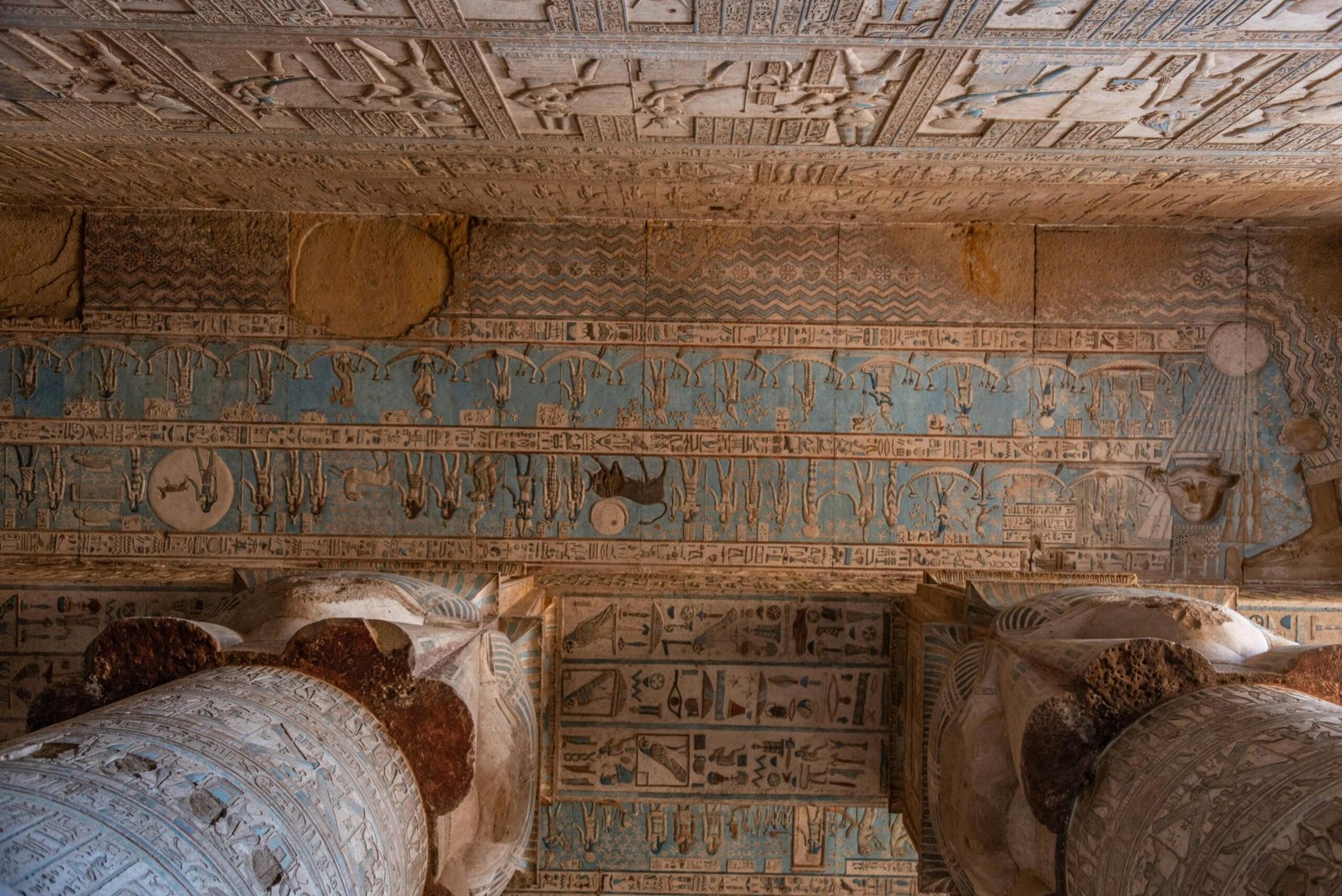  A photo of the astrological ceiling in the Temple of Hathor at Dendera, showcasing the intricate carvings of zodiac signs, planets, and constellations.