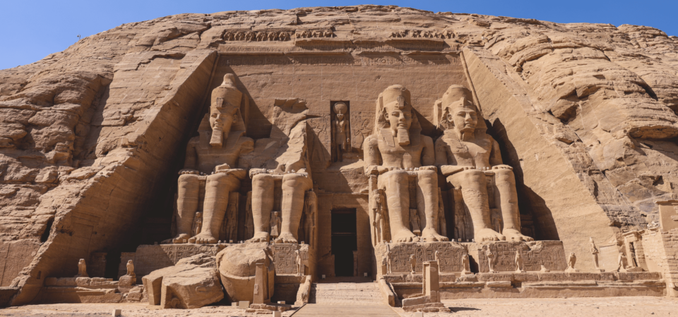 The majestic Abu Simbel Temple with colossal statues of Ramses II.