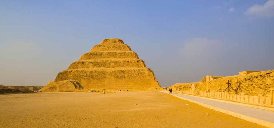 The Step Pyramid of Saqqara under a clear sky.