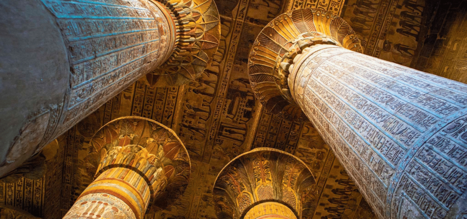 The intricately carved and colorful columns of the Hypostyle Hall at Esna Temple.