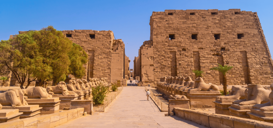 The Avenue of Sphinxes leading to the entrance of the Karnak Temple in Luxor.