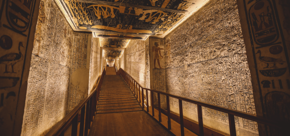 Ancient staircase adorned with detailed hieroglyphics at the Valley of the Kings, Luxor, Egypt.