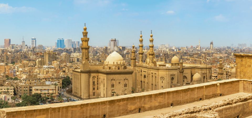 A panoramic view of Old Cairo, highlighting the Sultan Hassan Mosque