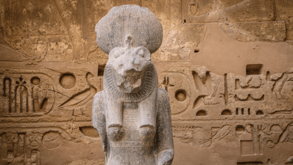 Stone statue of Sekhmet with traditional lioness features.